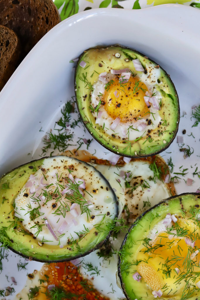 Savory Oven Baked Eggs in Avocados - Slice of Jess