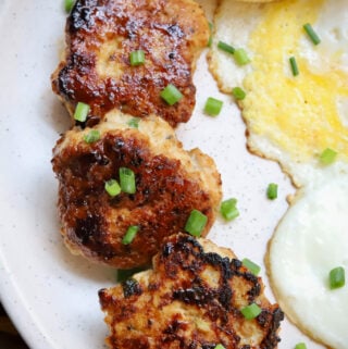Seared Chicken Sausage Patties on White Plate